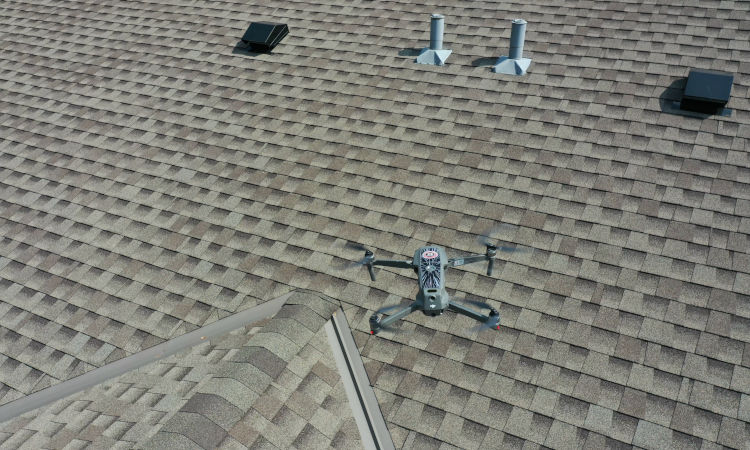 Drone performing emergency roof inspection.