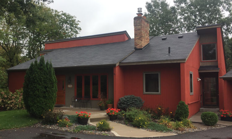 Red vertical house siding.