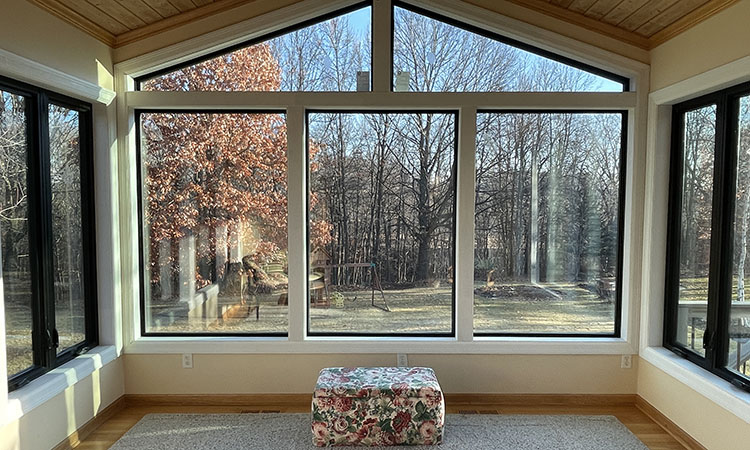 black fiberglass windows in a sunroom