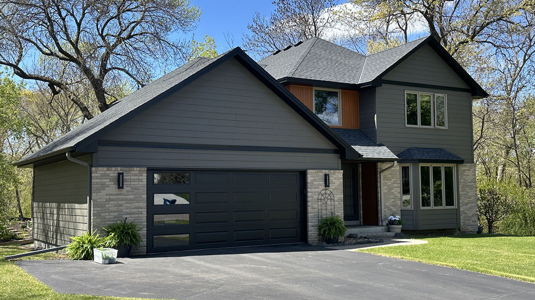 Angle view of completed composite siding installation on a home in Maple Grove, MN.